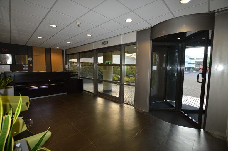 Spacious reception area and revolving glass entrance at River House, 1 Maidstone Road, Sidcup.
