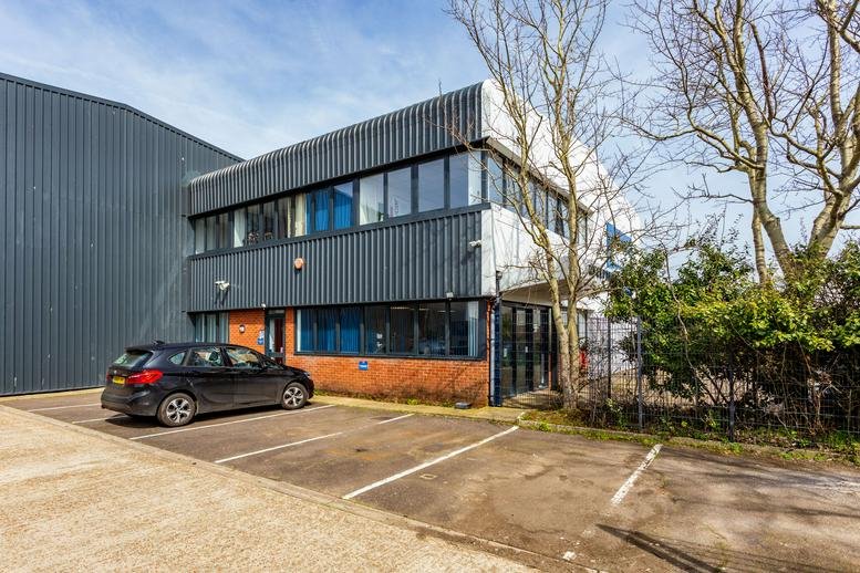 Facade of the Riverside Industrial Estate at Bridge Rd showing the multi-story workspace.