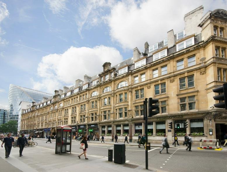 Grand stone exterior of Salisbury House, Finsbury Circus with classic architectural detailing and street level shops.