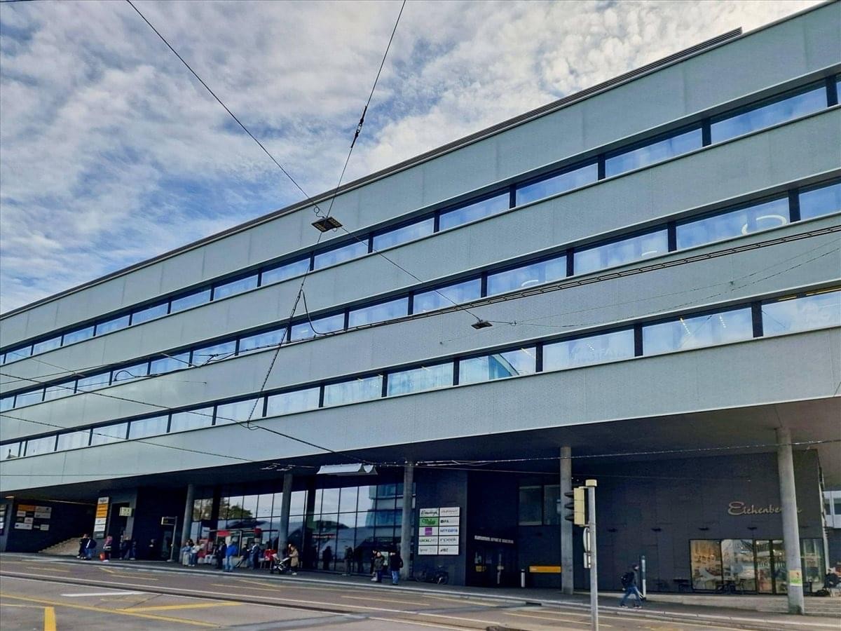 Exterior view of the contemporary multi-story building at Schanzenstrasse 4a, Bern, Switzerland.