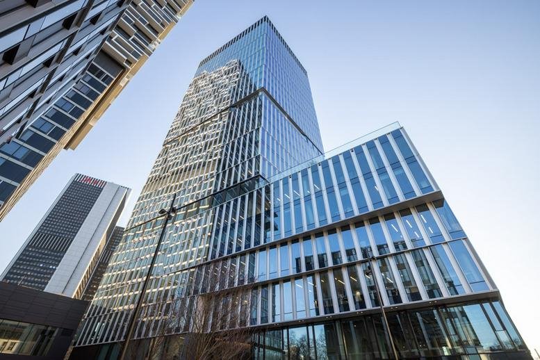 Exterior view of the soaring glass-facade Senckenberg-Turm building.