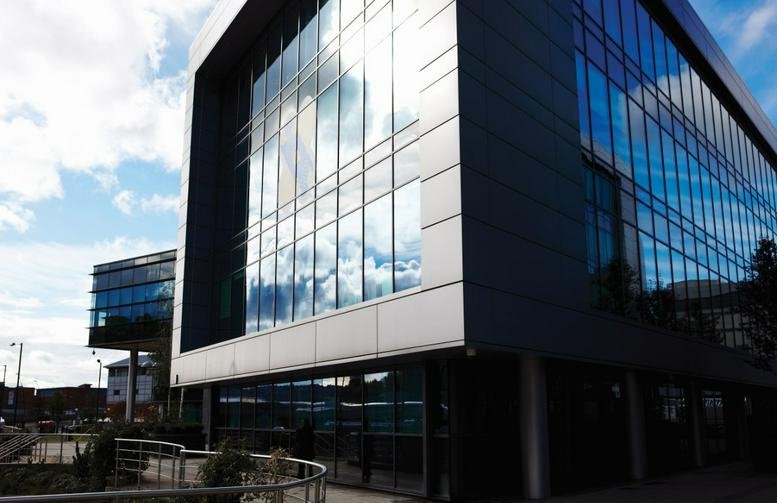 Exterior view of the modern glass-facade building at Sheffield Digital Campus, 3 Concourse Way.