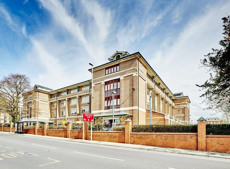 Exterior view of the brick facade and entrance at Southgate House, Southgate Street, Gloucester.