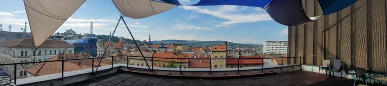 Panoramic rooftop terrace at Centrul Comercial Central overlooking the historic city skyline.