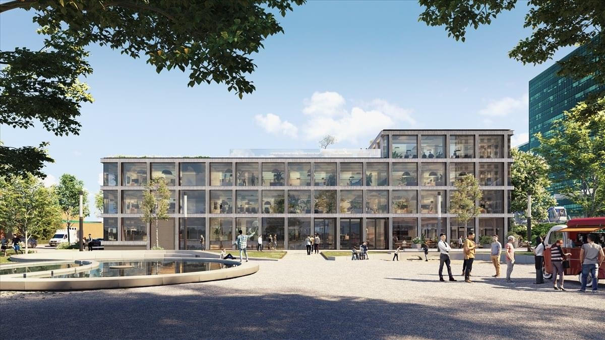 Exterior view of the modern glass and steel building at Strawinskylaan 6, Amsterdam, North Holland.