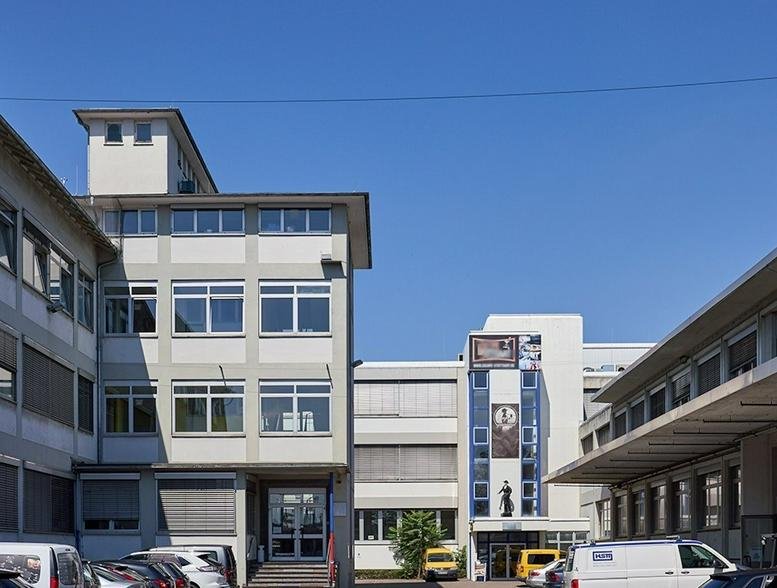 Exterior view of the multi-story commercial building at Stuttgarter Straße 106, Fellbach.