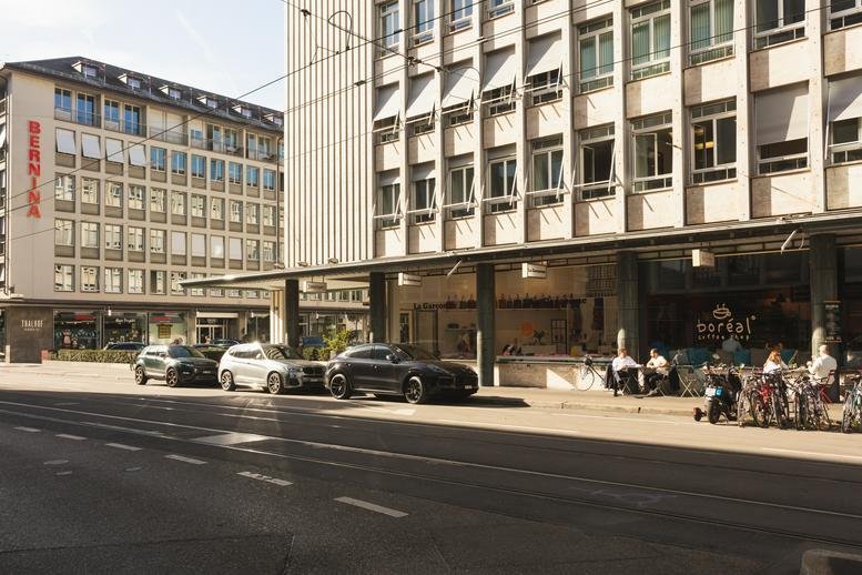 Exterior view of the classic stone and glass building at Talacker 41, Zurich, Switzerland.