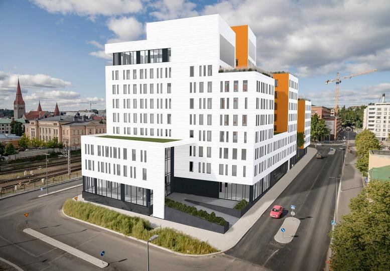 Exterior view of the white and orange Technopolis Asemakeskus office building in Tampere.