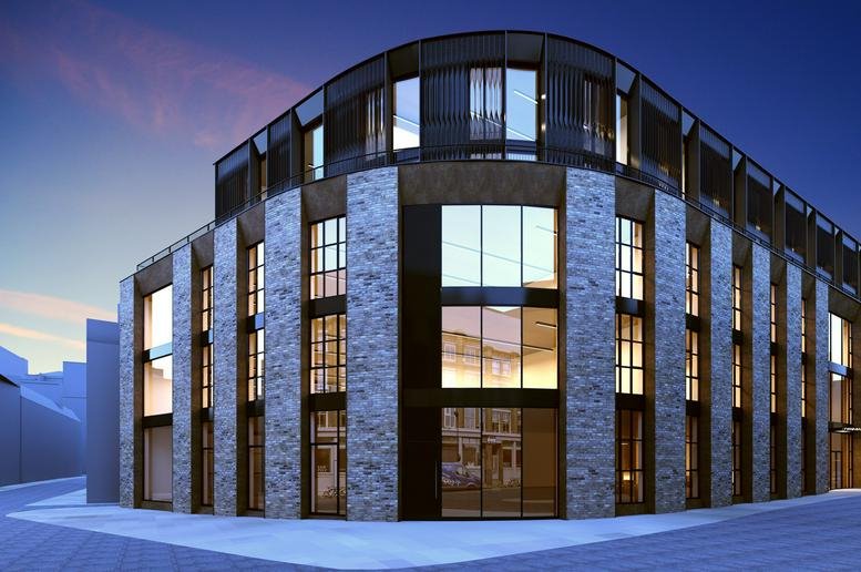 Exterior view of the curved brick and glass facade of The Frames, 1 Phipp Street, Shoreditch, Hackney.