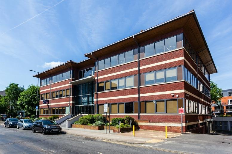 Exterior view of the brick and glass facade of The Place, Bridge Avenue, Maidenhead.