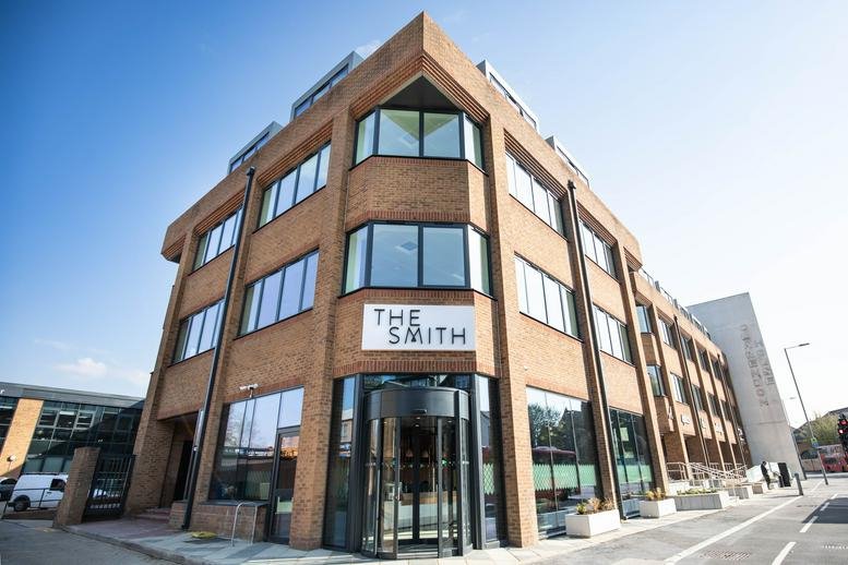 Exterior view of the brick and glass facade of The Smith, 145 London Road.