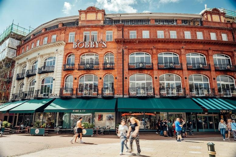 Exterior view of the historic red brick facade of Bobby’s at Patch, The Square.