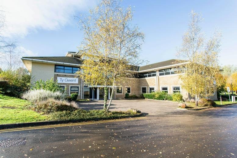 Exterior view of the brick and glass facade at Ty Gwent, Llantarnam Business Park.