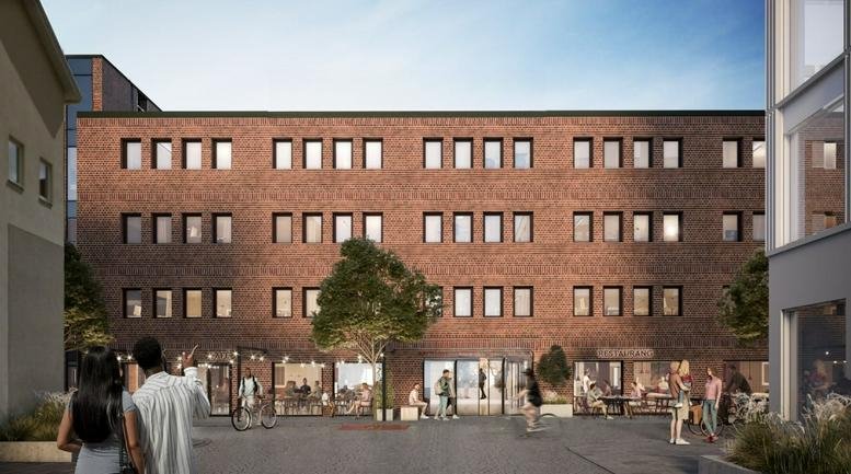 Exterior brick facade and courtyard of Vallgatan 8, Werket, Jönköping.