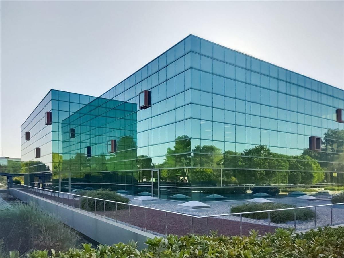 Exterior view of the contemporary glass-facade Vallsolana Garden Business Park.