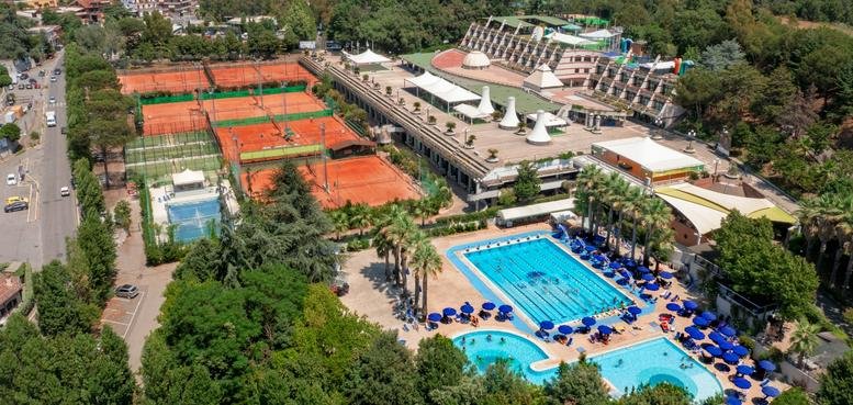Aerial view of the Forum Sport Center Roma featuring clay tennis courts, swimming pools, and main club buildings.
