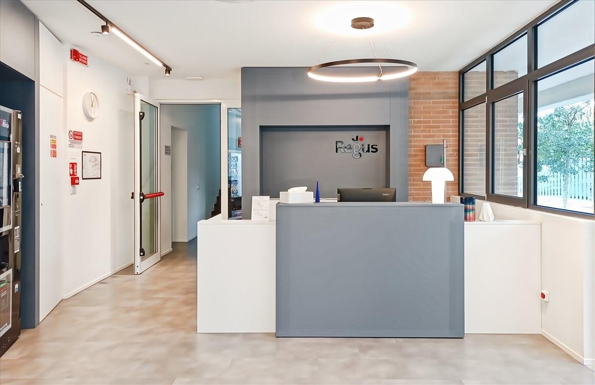 Modern grey reception desk at the Business Centre, Via Emilio Zago, City Centre, Bologna.