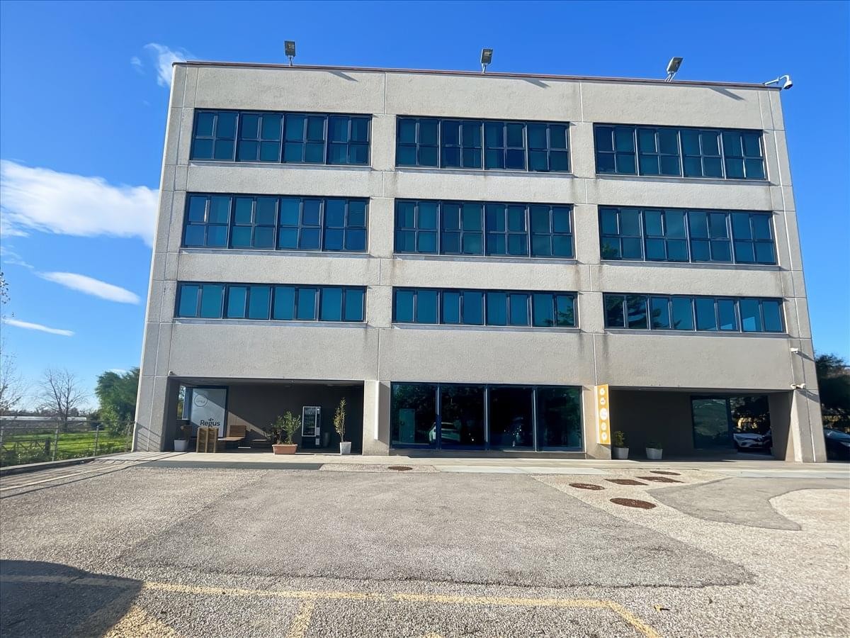 Exterior view of the modern office building at Via Giulio Pastore n. 24, Salerno.