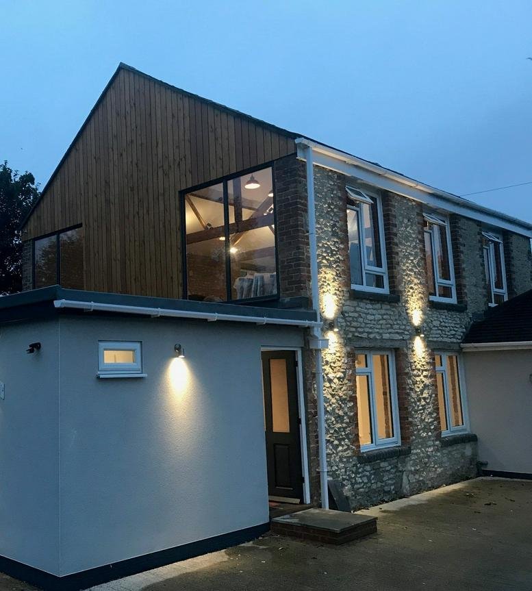 Exterior view of the stone and timber facade at Victoria Road, The Old Bakery.