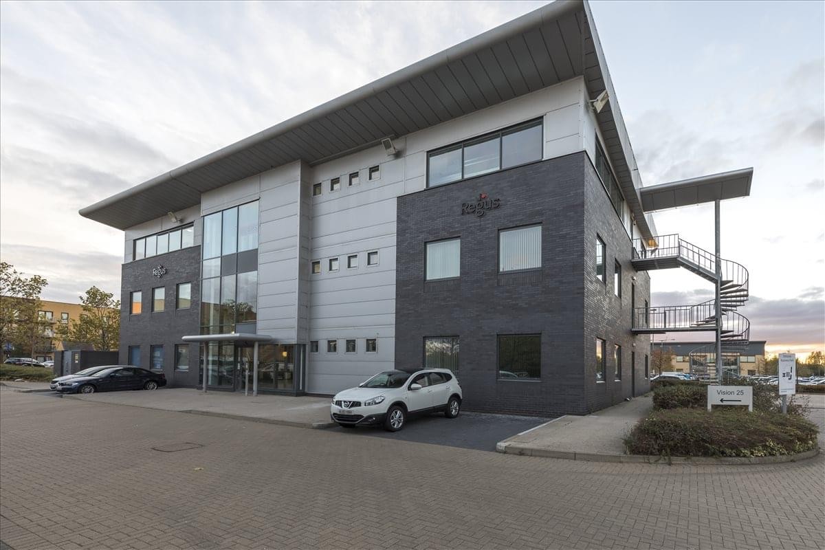 Exterior view of the modern three-story office building at Vision 25, Innova Park, Enfield.