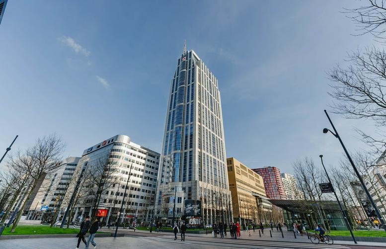 Exterior view of the modern high-rise skyscraper at Weena 690, Rotterdam.