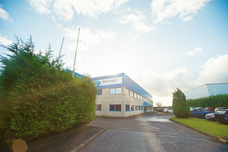 Exterior view of the office building at Southam Drive showing the facade and parking area.