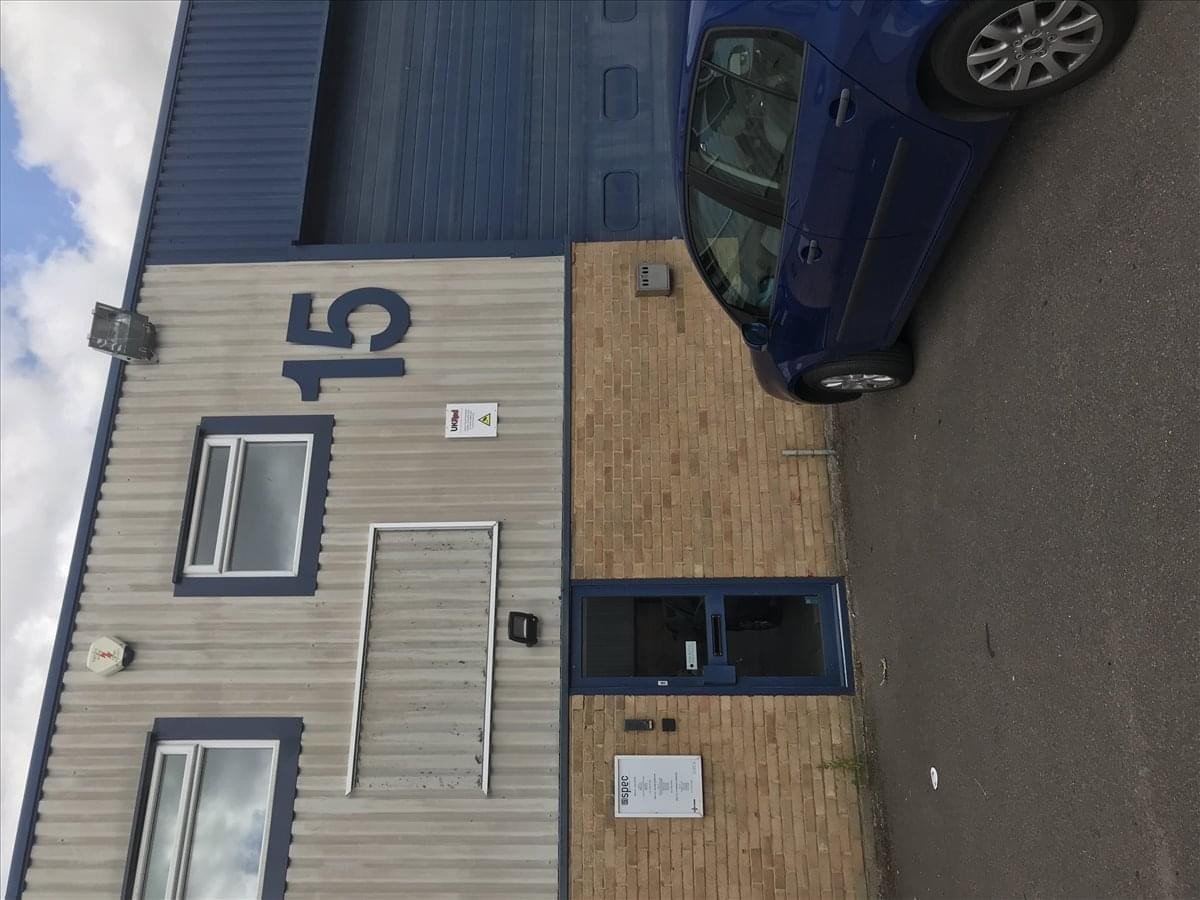 Exterior view of the warehouse and office facade at Unit 15 Tower Industrial Estate.