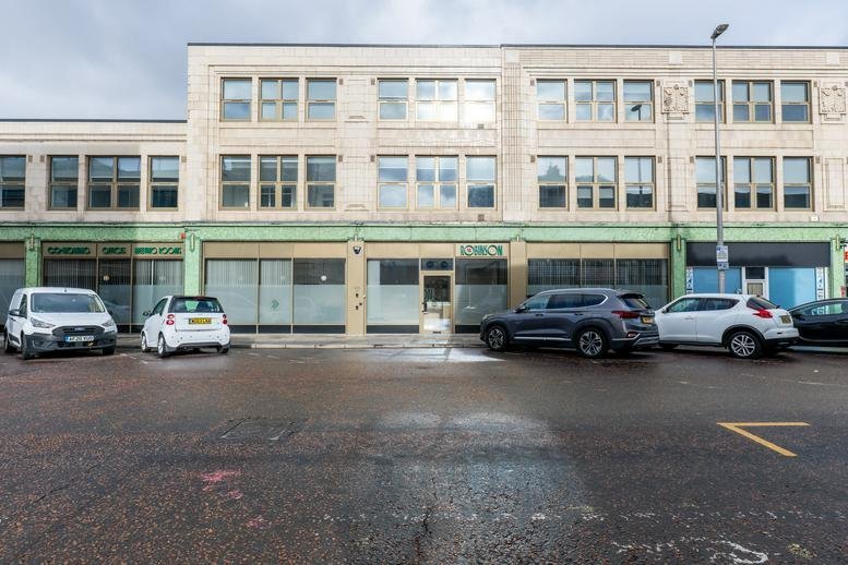 Exterior view of the classic stone facade at The Robinson, 150 - 158 Church Street.