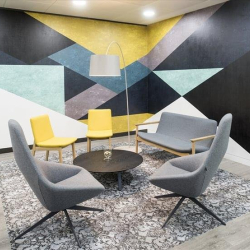 Creative breakout area with colorful geometric mural and modern lounge seating, One Kingdom Street, London, W2.