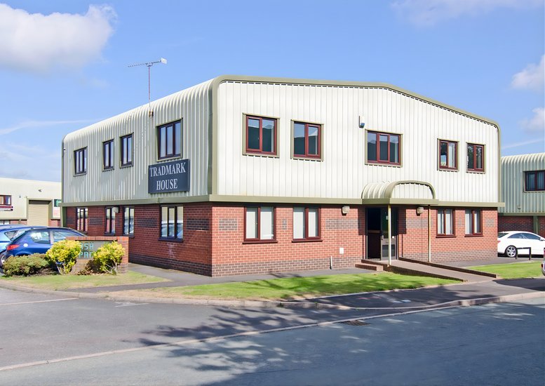 Exterior view of the brick and metal facade of Unit 5 Ash Park, Hyssop Close.