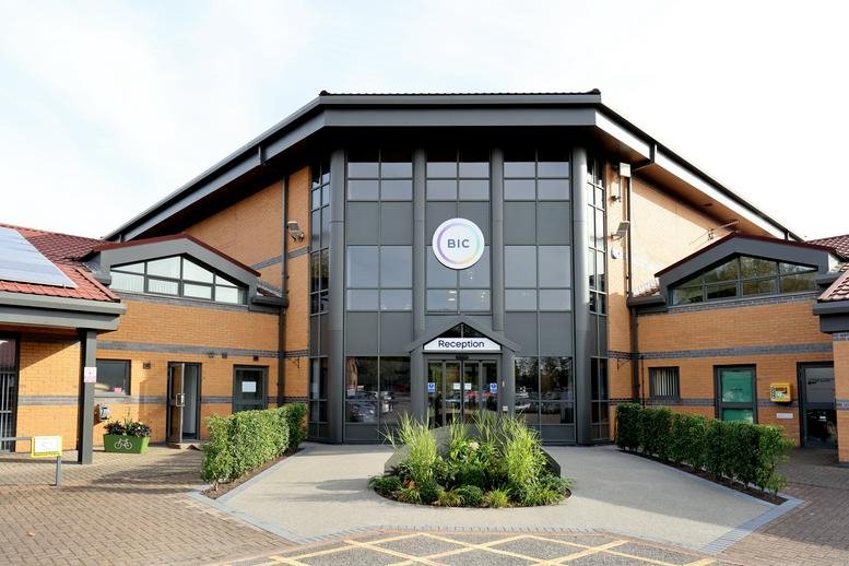Exterior view of the brick facade and entrance at Wearfield, Enterprise Park East, Sunderland.
