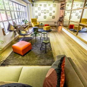Creative breakout lounge with colourful chairs and natural light, 2 Bath Place, Shoreditch, London. Click for details.
