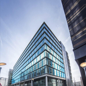 Modern glass exterior of One Kingdom Street office building at dusk, London, W2.. Click for details.